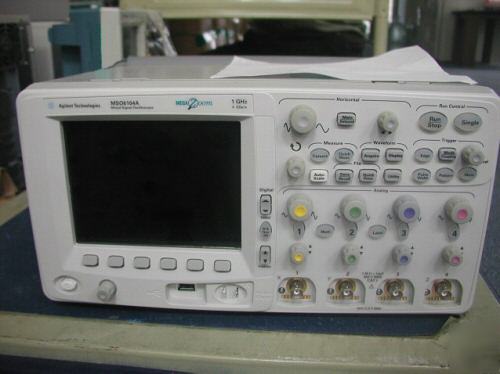 New agilent MSO6104A w/ warranty to 2008 probe 