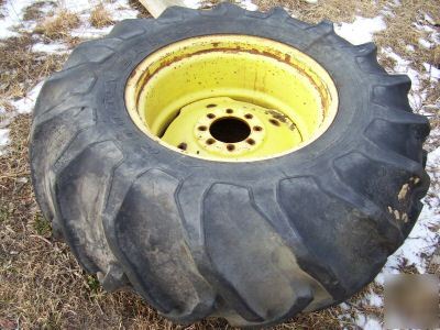 John deere combine tires/rims pulling tractor 