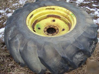 John deere combine tires/rims pulling tractor 