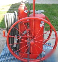 2-wheels/rims off ansul-red line-fire extinguisher/pump