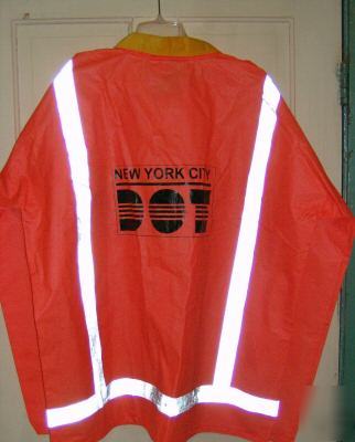 Fluorescent orange raincoat with scotchlite nip