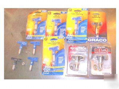 Lot o' paint spray tips 10 in package, 4 out