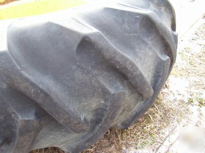 John deere combine tires/rims pulling tractor 