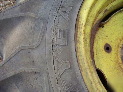 John deere combine tires/rims pulling tractor 