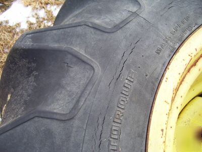 John deere combine tires/rims pulling tractor 