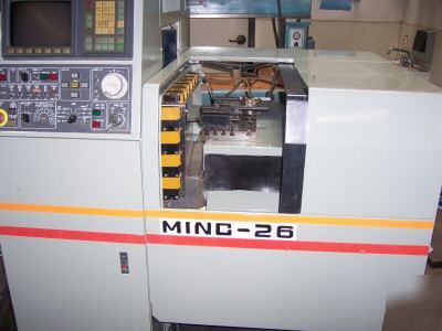 1990 akebono cnc minc-26 gang-style lathe w/ fanuc 0T