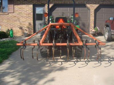 Track scratcher or spring tine harrow , food plots