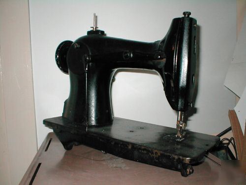 Singer # 95-100 heavy duty sewing machine all metal