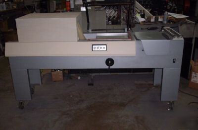 X-rite model 706 l bar sealer with shrink wrap tunnel