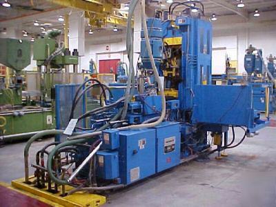 New 200 ton, 9 oz. bury injection molding machine '94