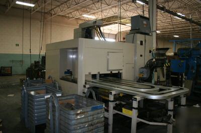 New hitachi seiki vertical cnc lathe w automation 2000